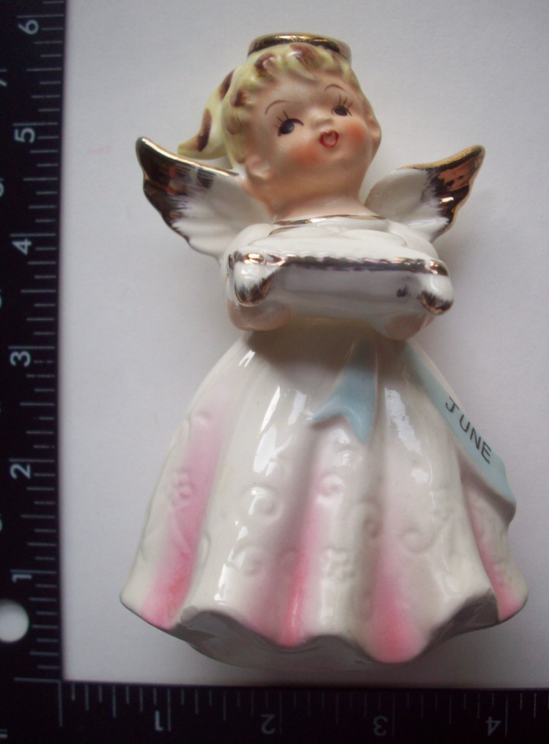 June Angel holding wedding bands rings porcelain angel figurine