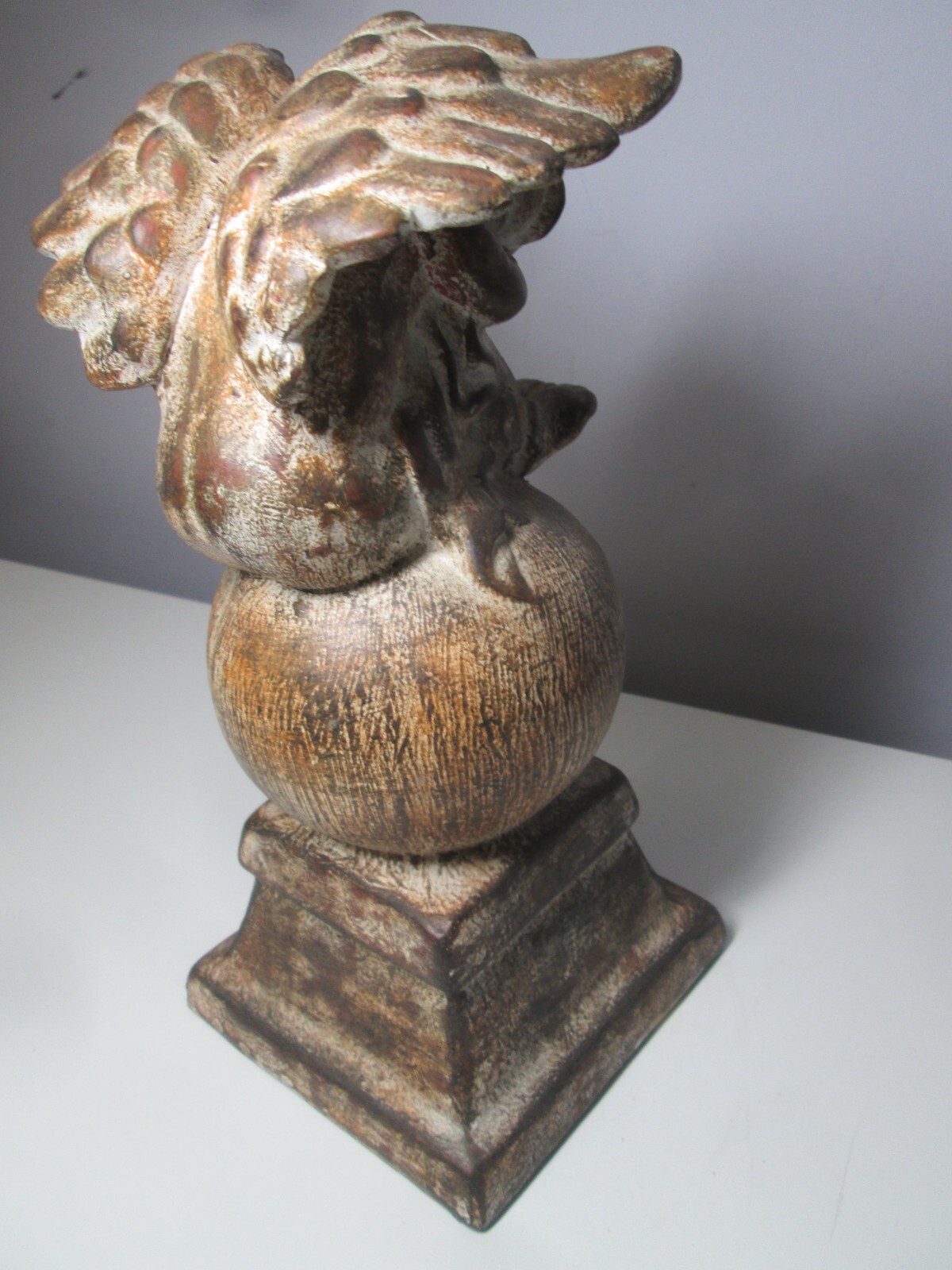 Ceramic Cherub on a Globe inside or outside Décor