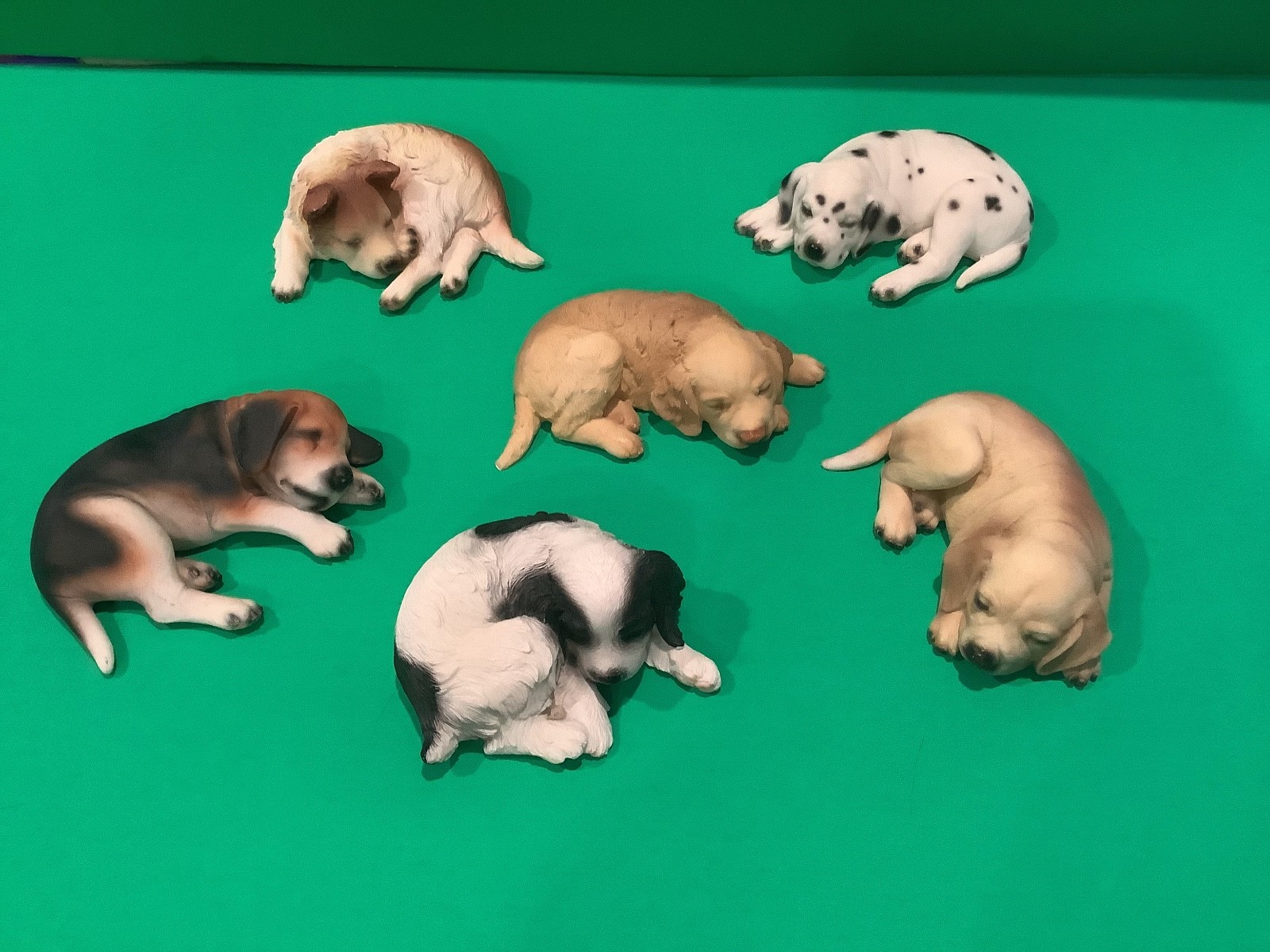 sleeping puppy figurines