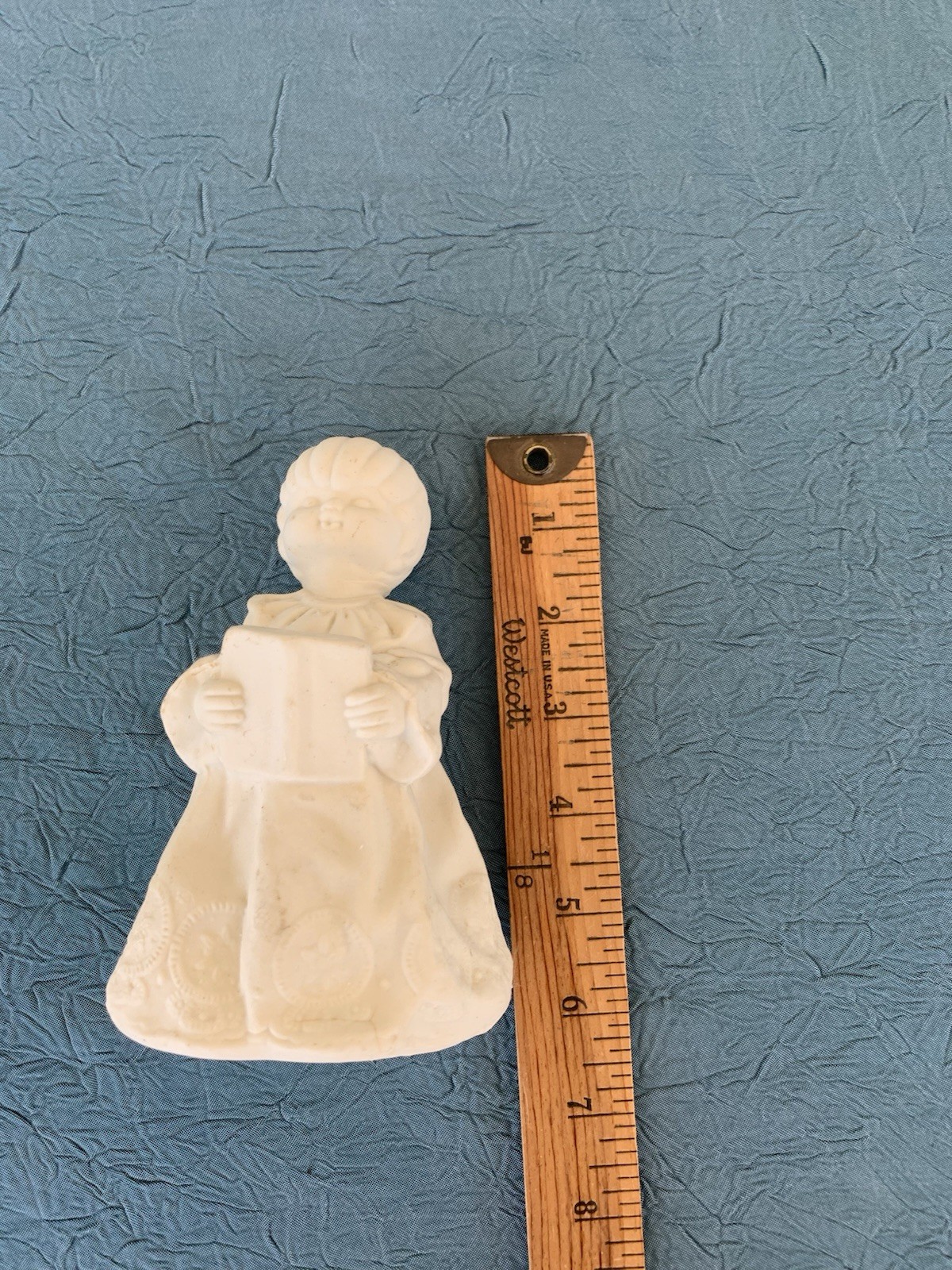 White ceramic unpainted reading / ￼ Caroling child. Chrustmas craft vintage