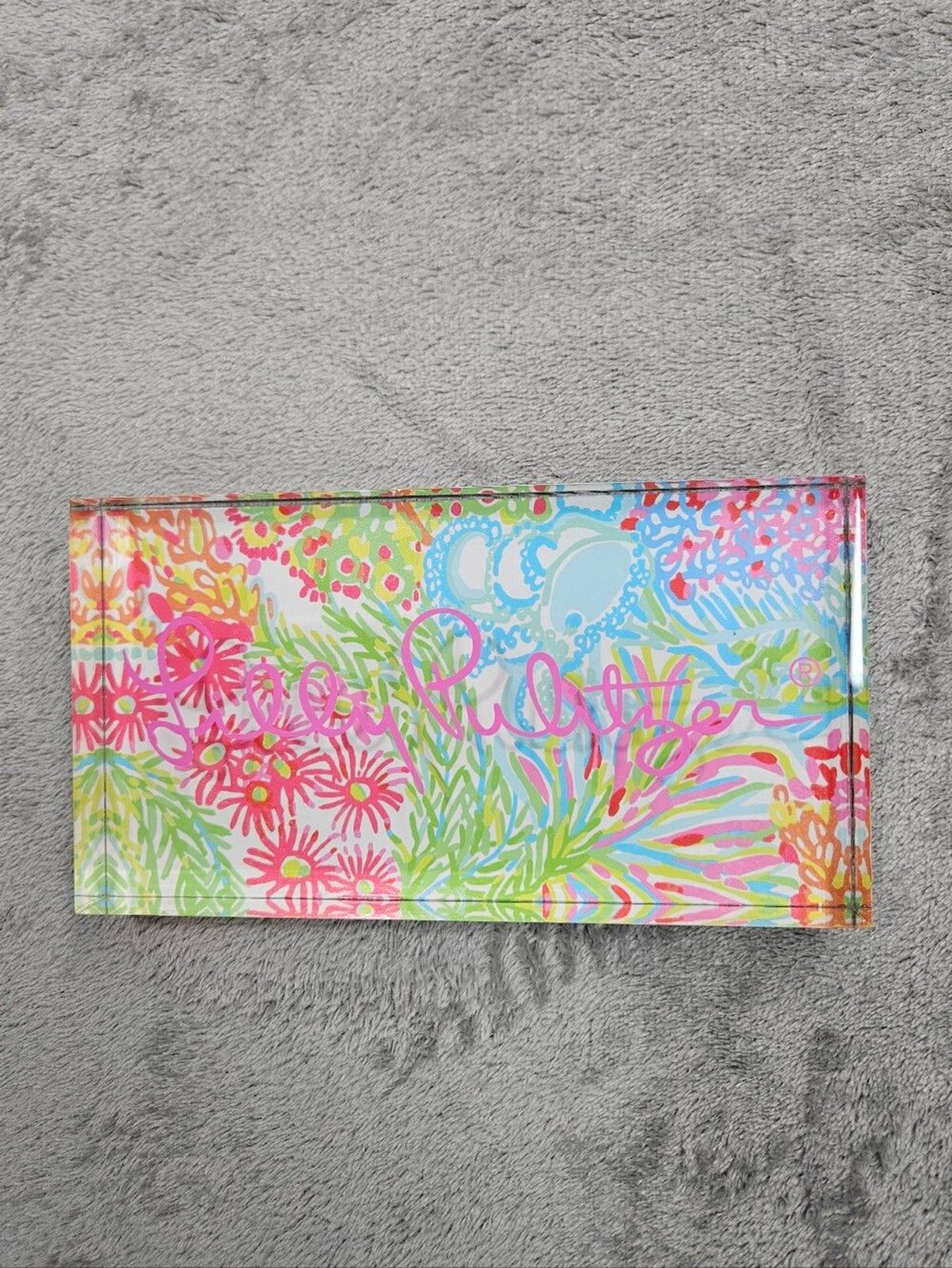 Lilly Pulitzer branded acrylic desk block featuring the Lovers Coral print.