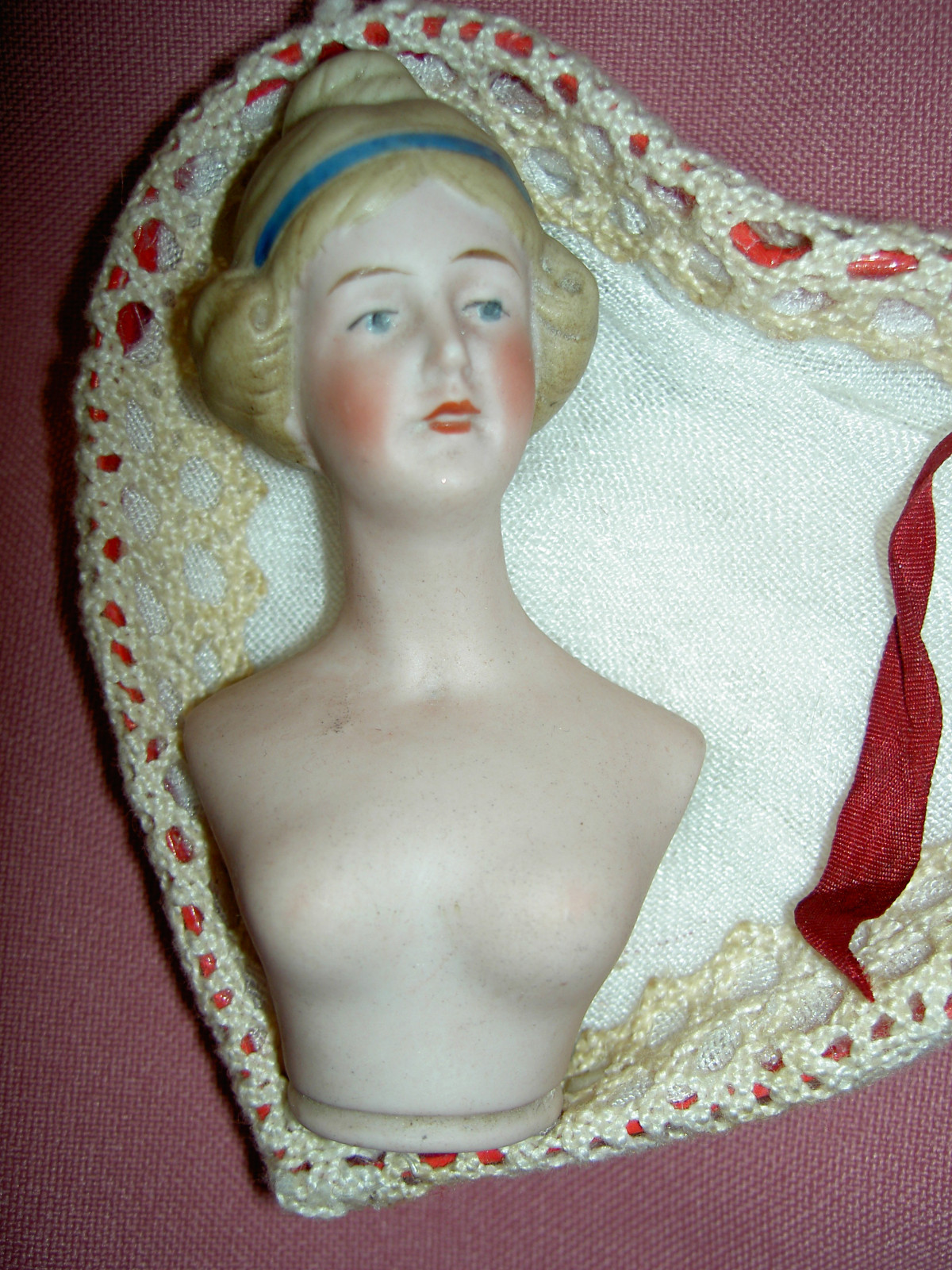 Fine quality antique German, boudoir bisque half doll intaglio eyes,molded hair