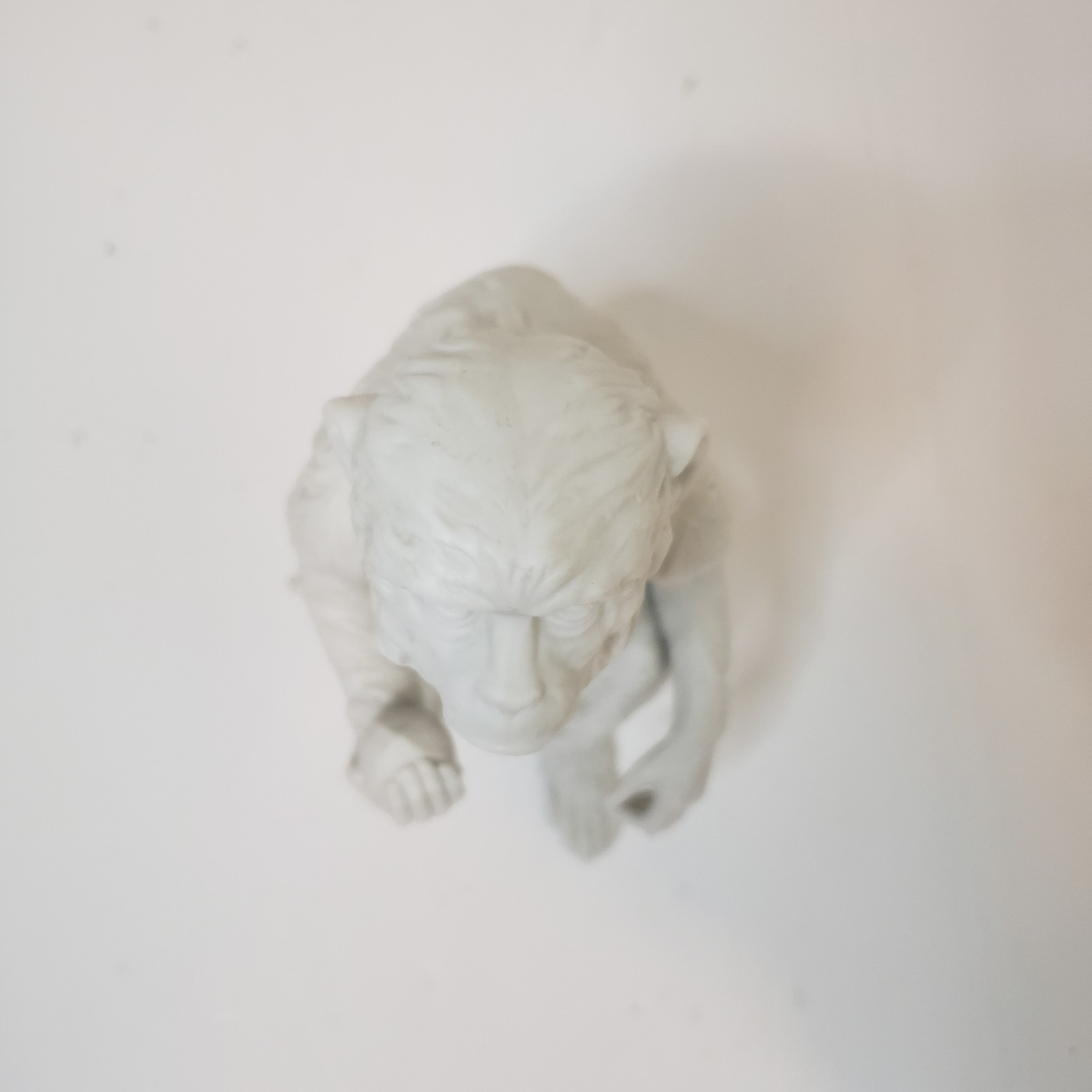 White Bisque Porcelain Sitting Monkey Holding Rock Figurine Vintage