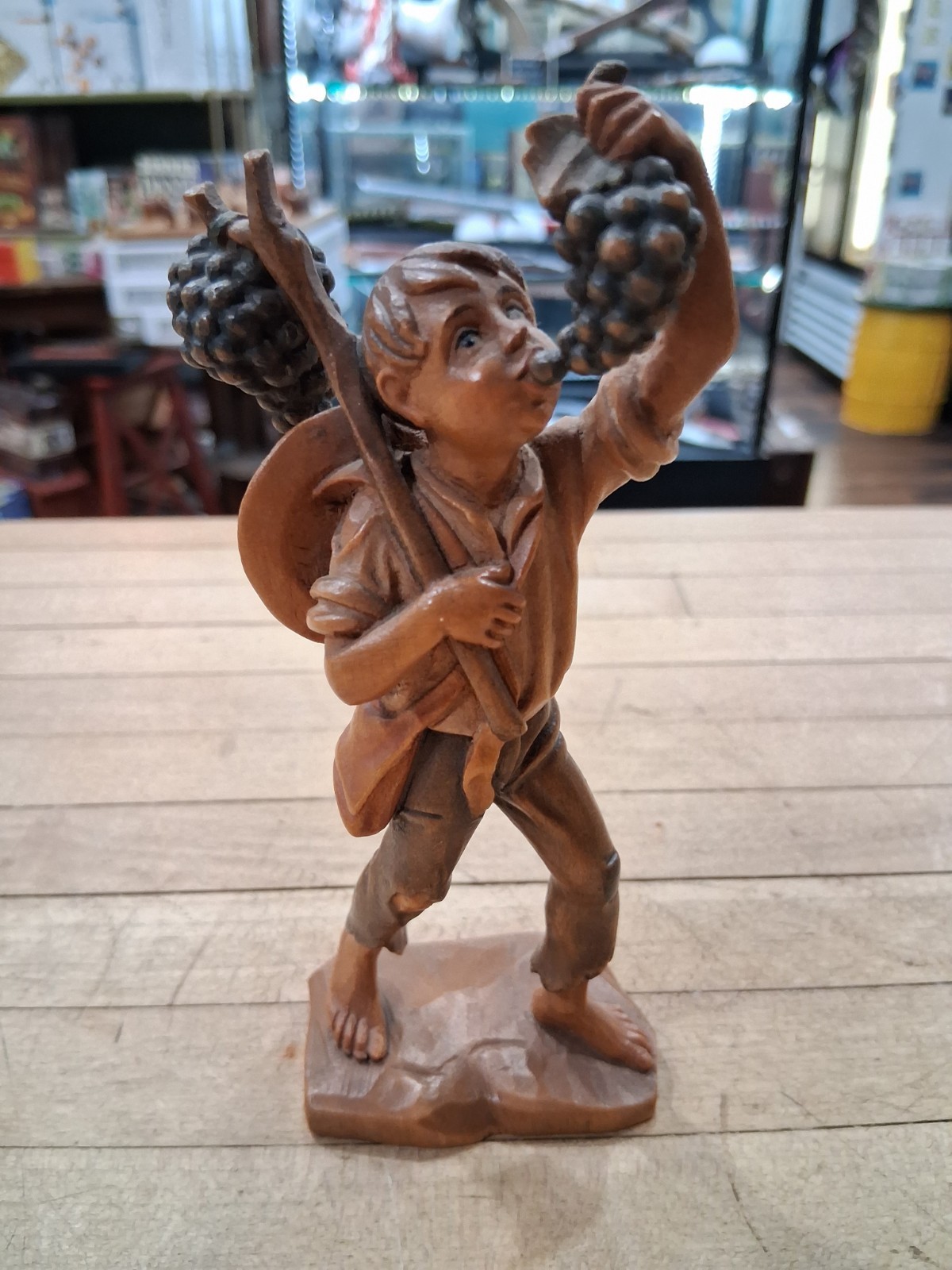 Huggler Wood Carving Boy With Grapes Figurine Switzerland