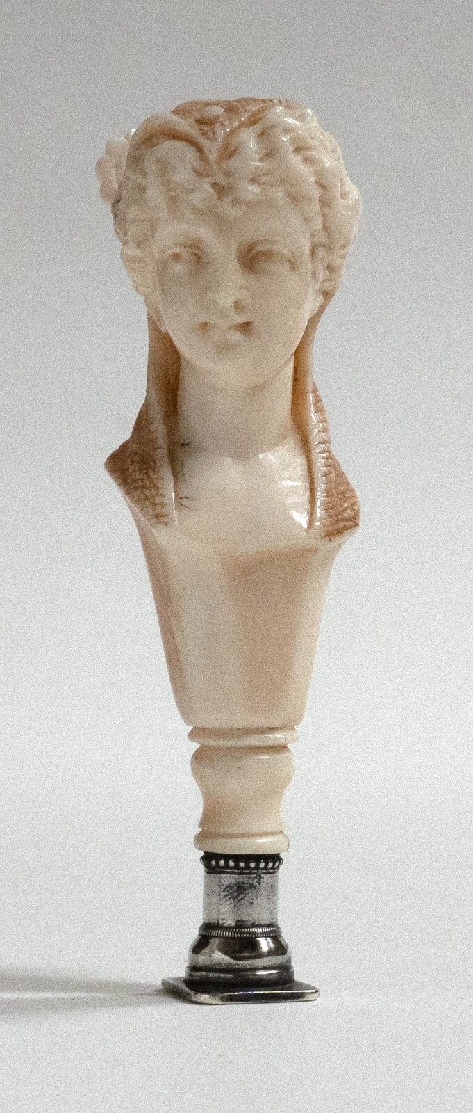 Antique women figure with silver stamp.