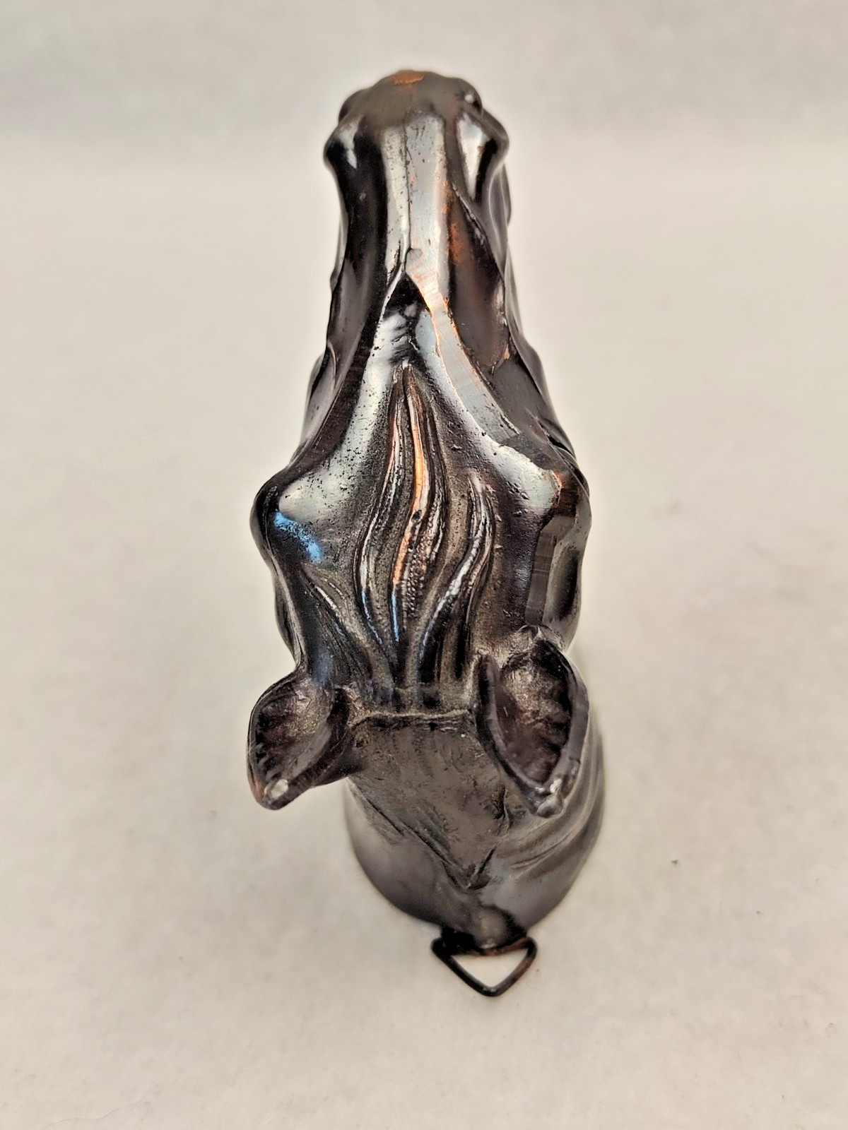 A decorative wall sculpture in the shape of a horse’s head