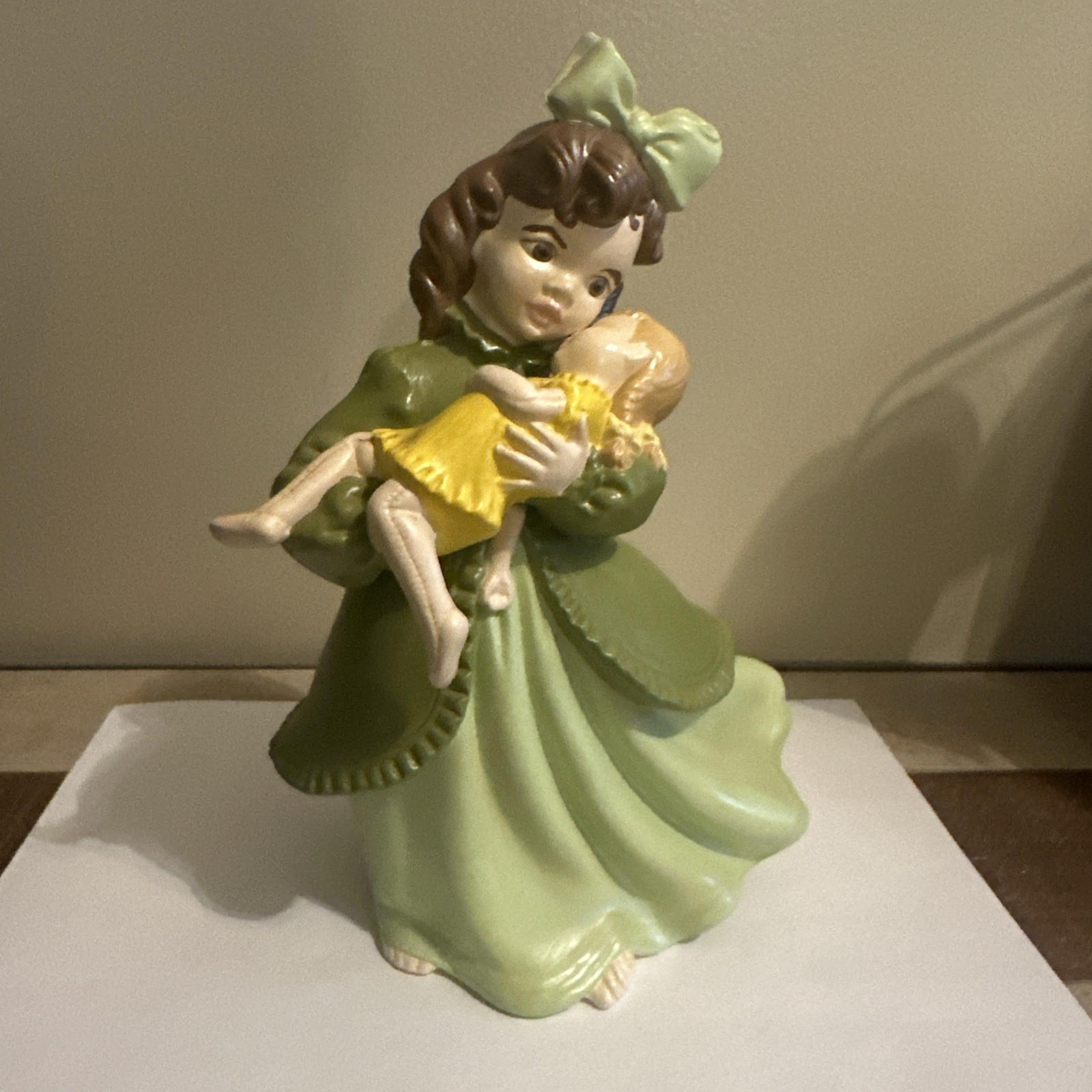 Atlantic Mold Girl Green Dress Holding Yellow Doll Brunette Brown Hair