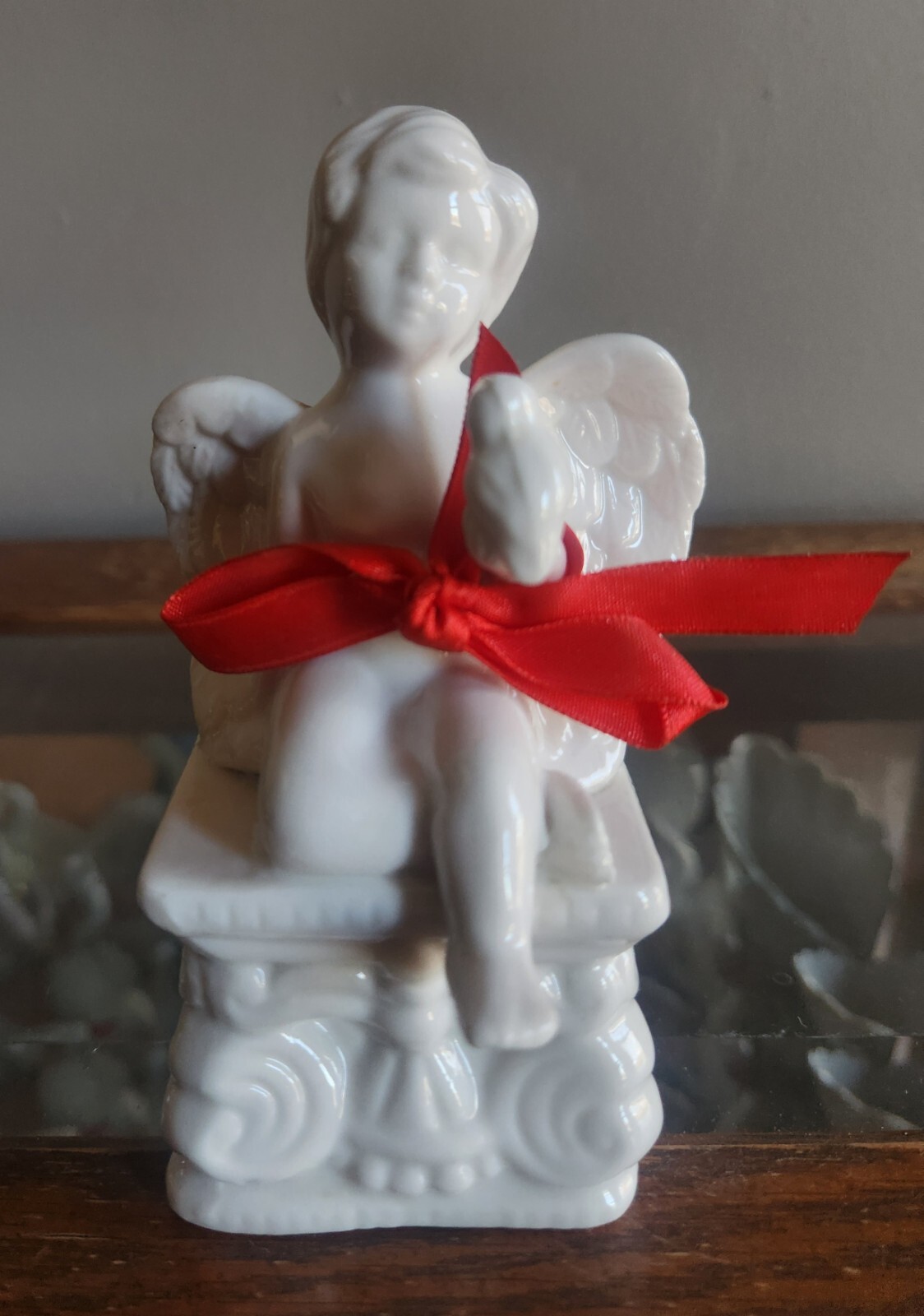 White Ceramic Cherub Angel Boy Figure Sitting On A Colum • 5″ Tall