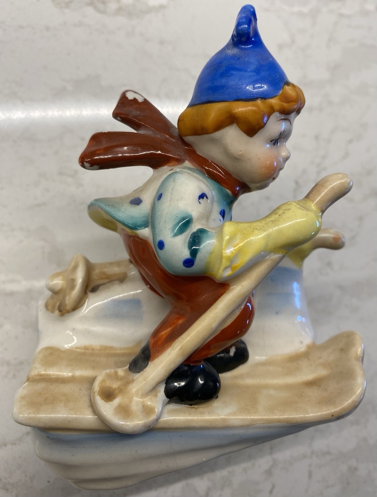 4 Skier Figurines: 1 Napco Planter, 1 “Made In Occupied Japan”, 2 Marked “Japan”