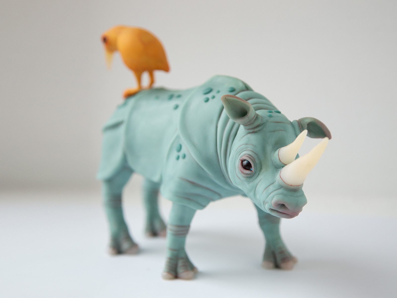 Perfect marriage – weird sculpture gift for couple, rhino and bird family statue
