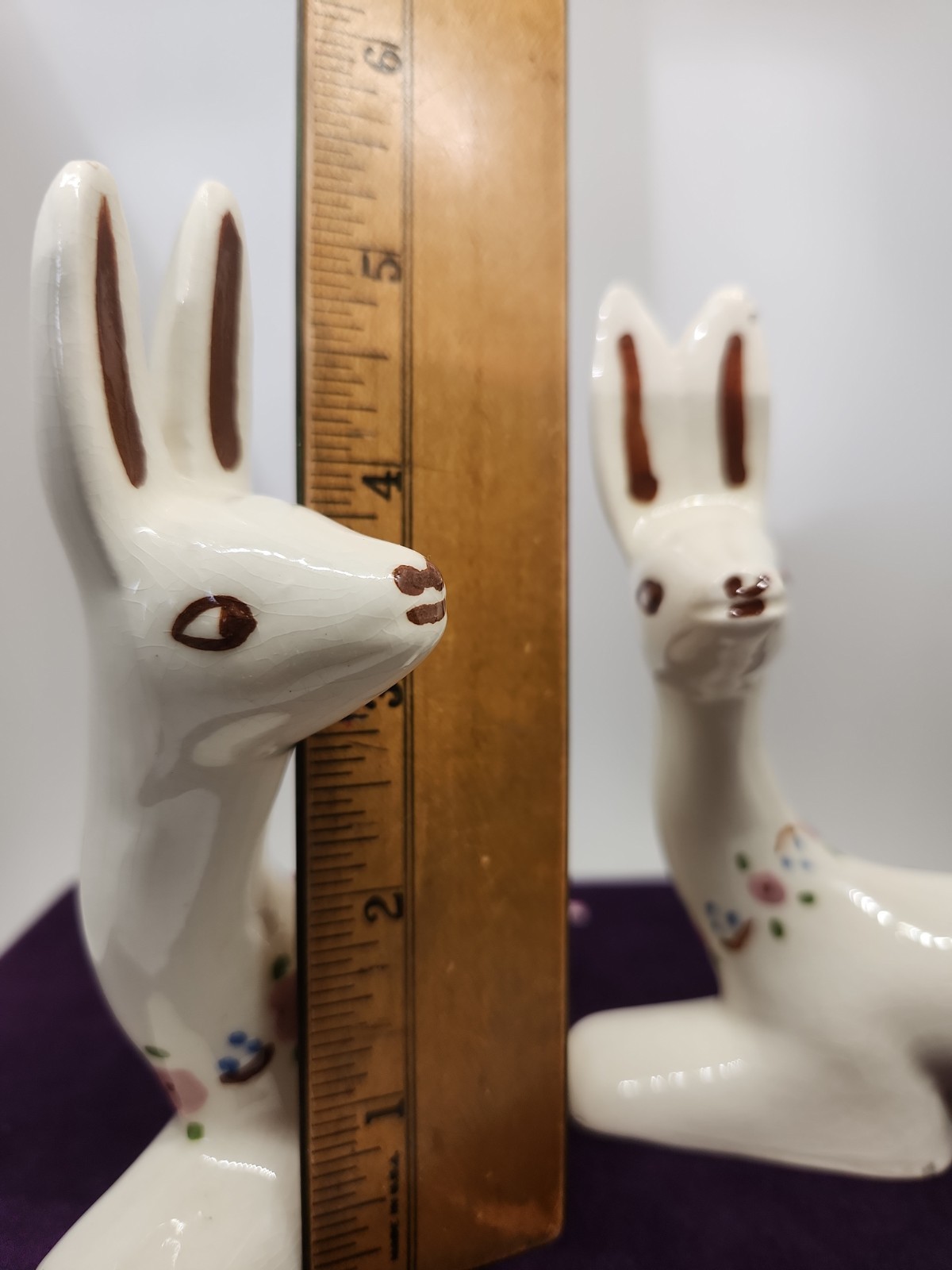 Vintage ceramic deer figurine with painted floral accents. “T” & “W” Marking.
