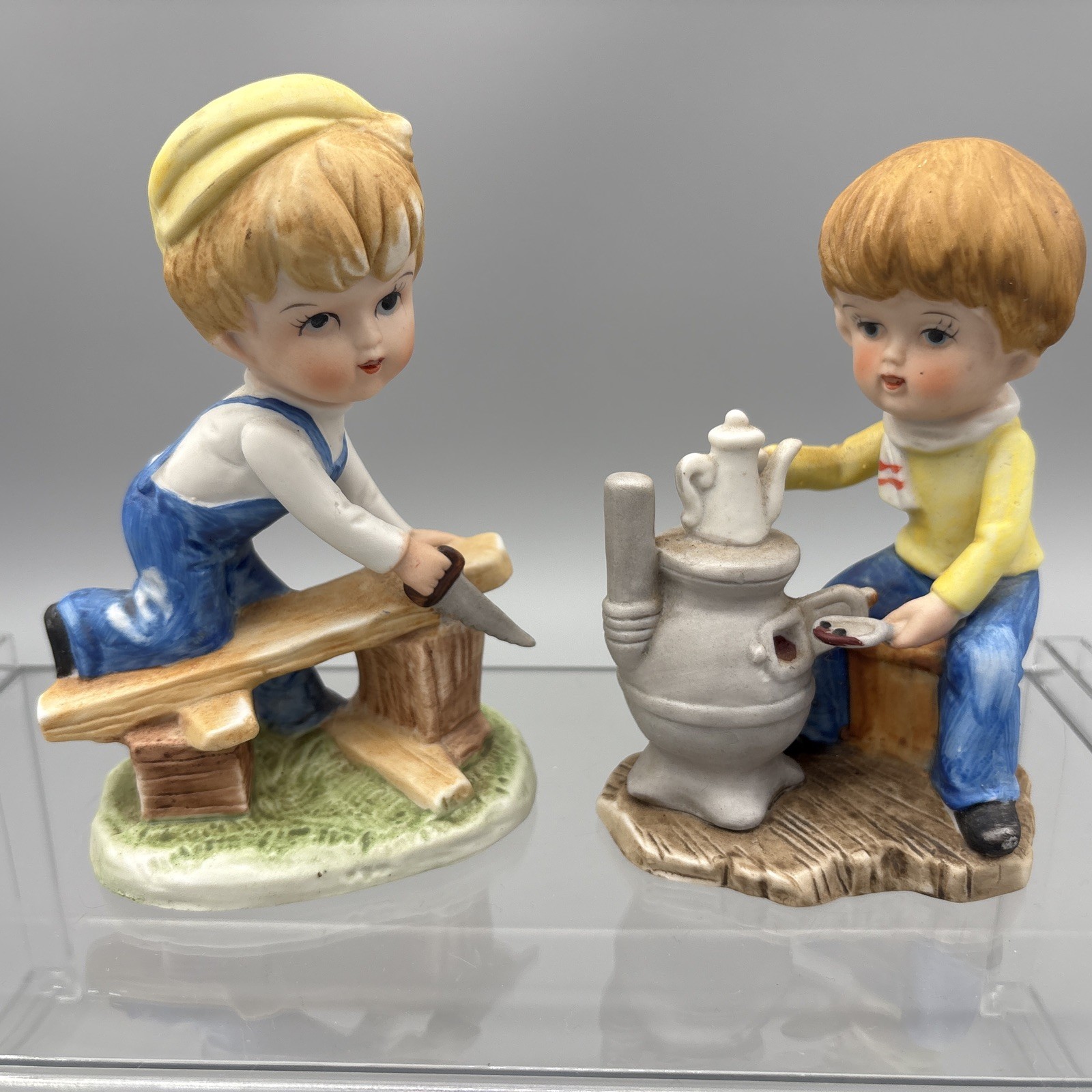 Vintage Ceramic Boy Stove Cooking & Saw Wood work Figurine home improvement