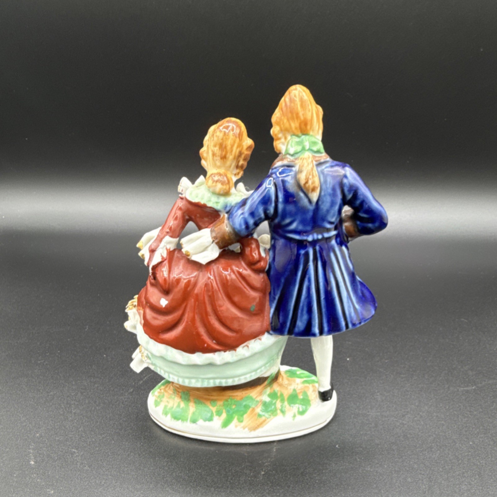 Made in Japan porcelain figurine of Victorian couple, hand painted, missing hand