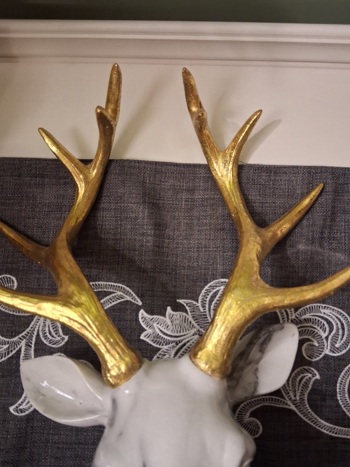 White Marbled Deer Head Hangs On Wall With Gold Antlers About 18″ Tall