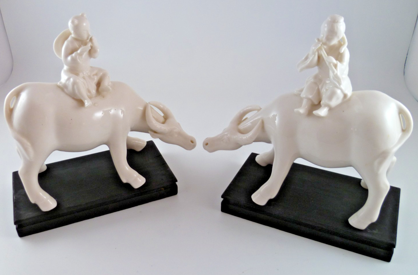 Pair 2 Chinese Blanc de Chine Porcelain Figurine Boy Flute Water Buffalo Read