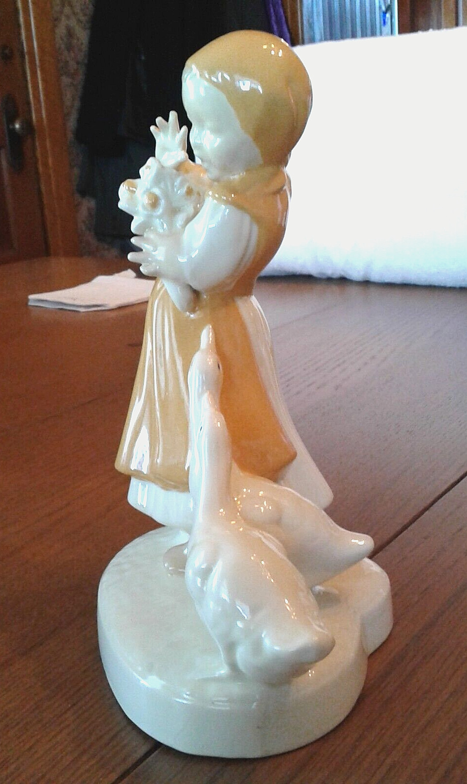 LOVELY GIRL WITH GEESE AND FLOWERS, 9 INCHES TALL & 7 INCHES WIDE FIGURINE