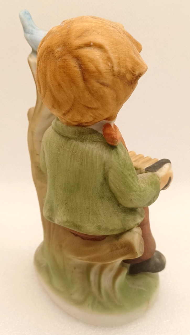 VTG YOUNG BOY PLAYING AN ACCORDIAN TO A BLUE BIRD ON A BRANCH-4 3/4″ TALL