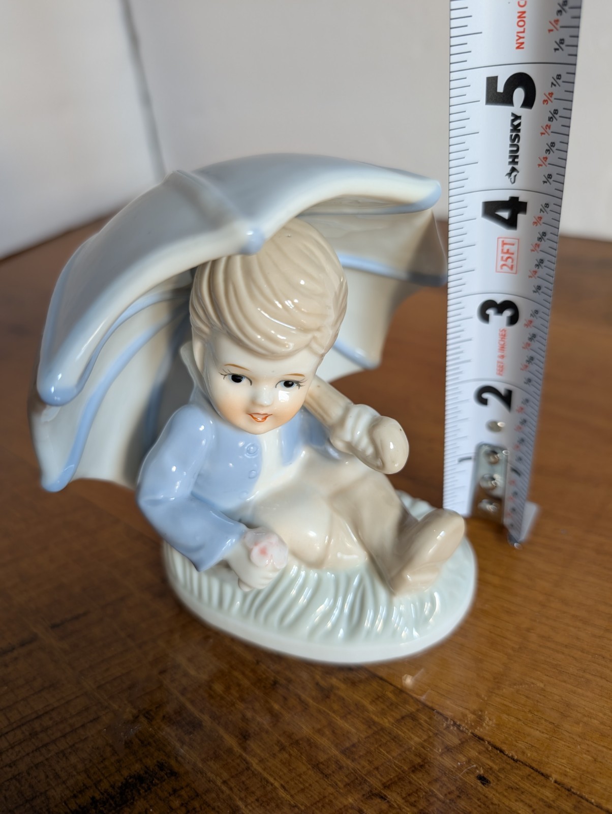Duncan Royale Fine Porcelain Boy Sitting Under Large Umbrella