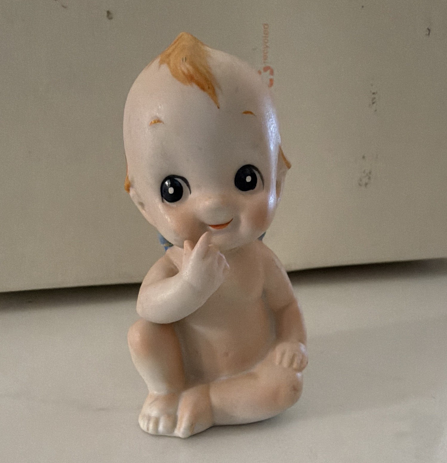 Porcelain Baby Figurine Sitting Beige Blue Orange Matte Small