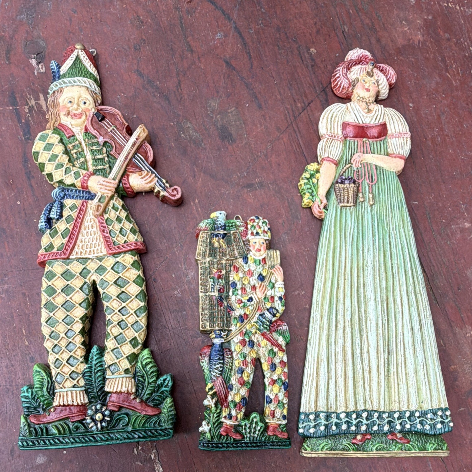 Set of 3 painted resin medieval wall-hangings