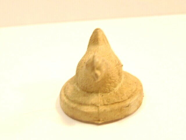 Small unpainted molded hard plastic or composite nesting chicken