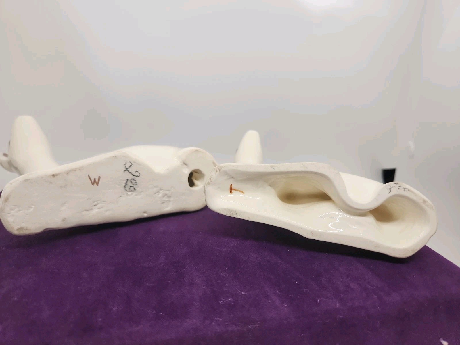 Vintage ceramic deer figurine with painted floral accents. “T” & “W” Marking.