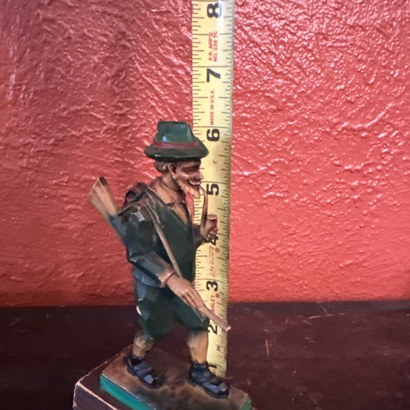 Vintage celluloid Or Resin Hunter Figurine 6″ tall With Gun & Pipe Hand Carved