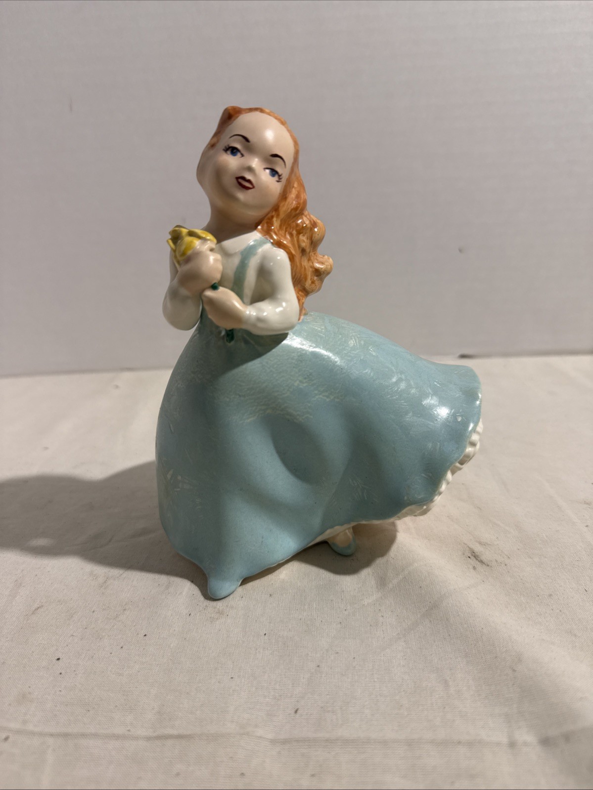 Vintage Holland Mold Girl In A Blue Dress W/ Orange Hair And Yellow Flowers.