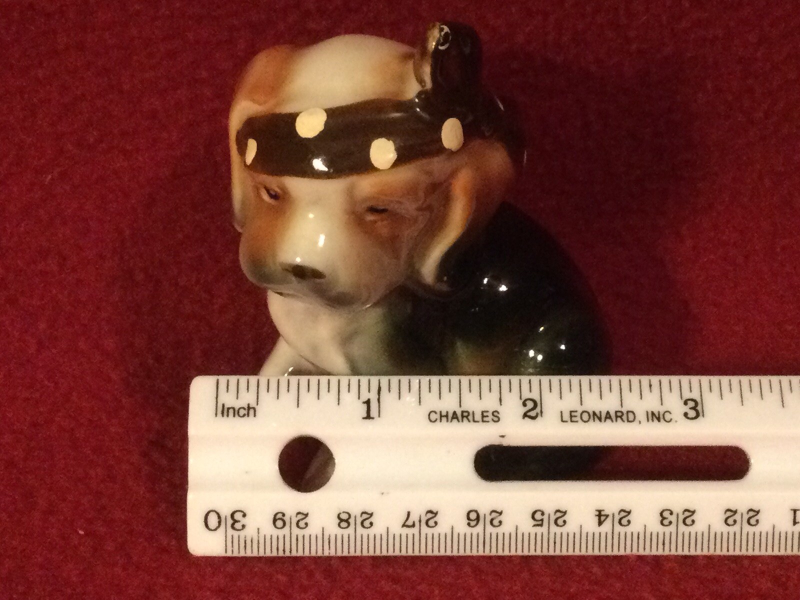 Vintage whisical Ceramic Dog Figurine with head scarf approx. 2.5″