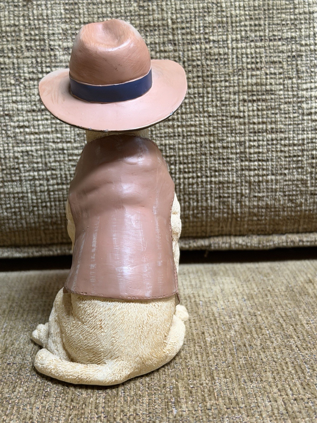 lifelike dog figurine in clothes