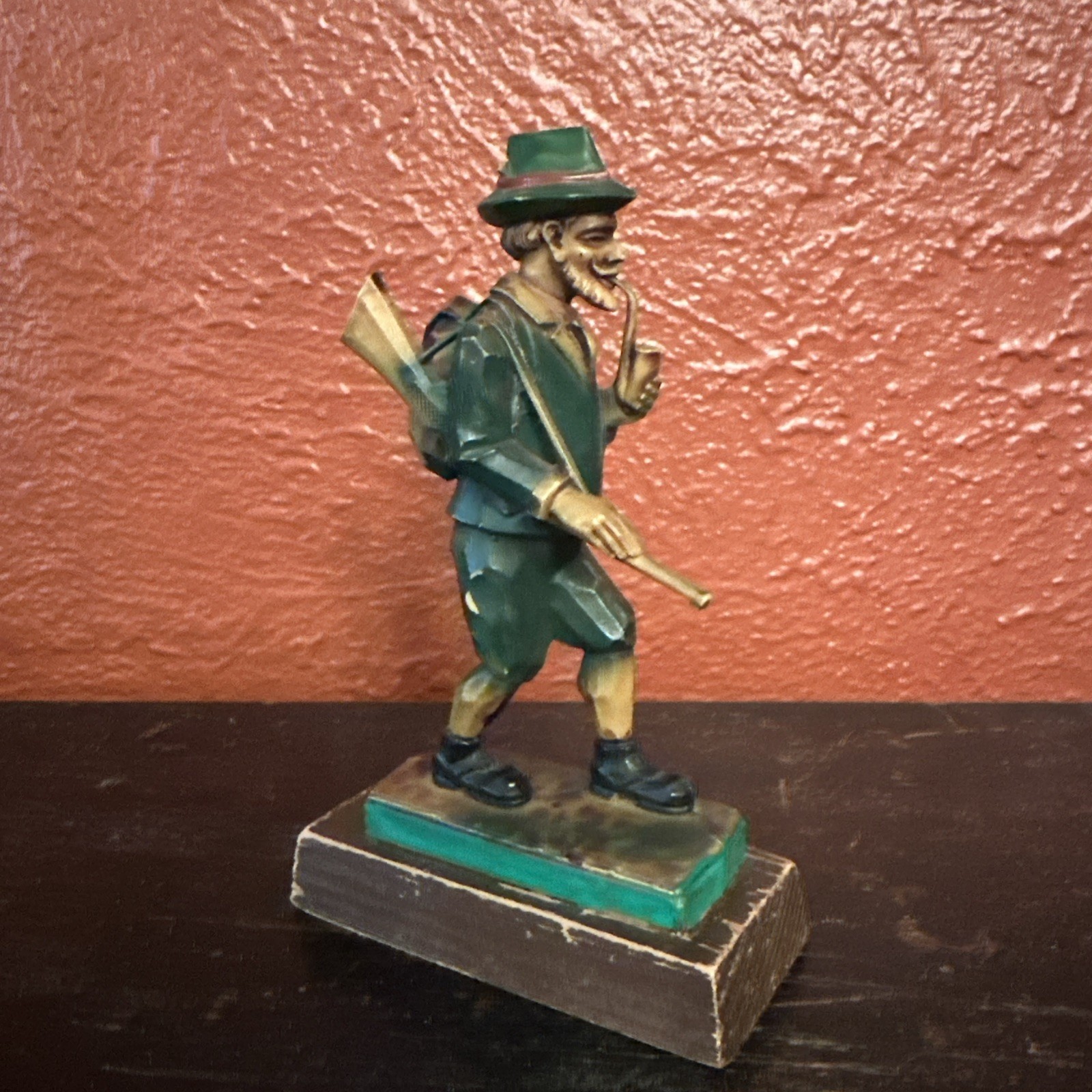 Vintage celluloid Or Resin Hunter Figurine 6″ tall With Gun & Pipe Hand Carved