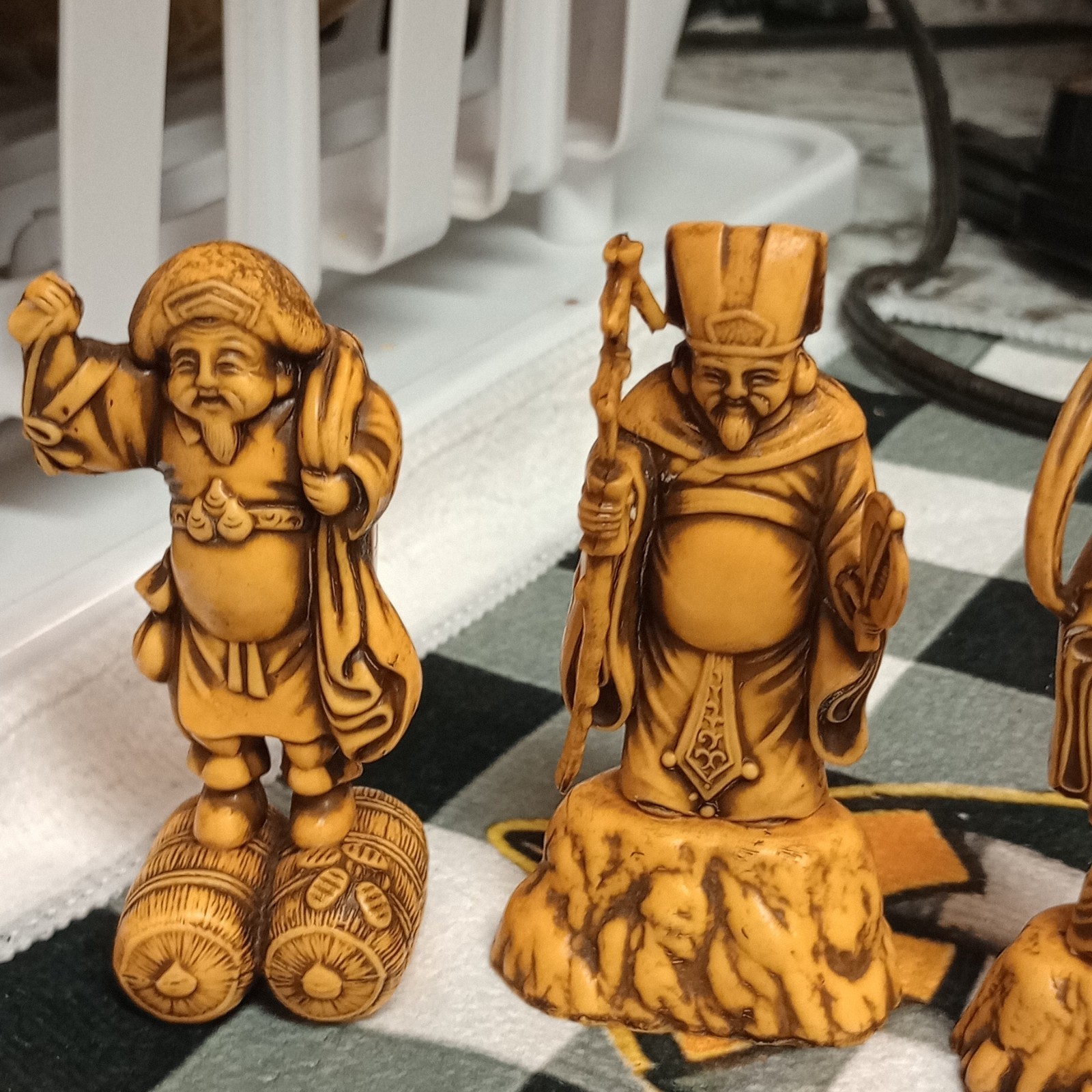 partial set of six vintage mid-century Japanese celluloid or resin lucky gods
