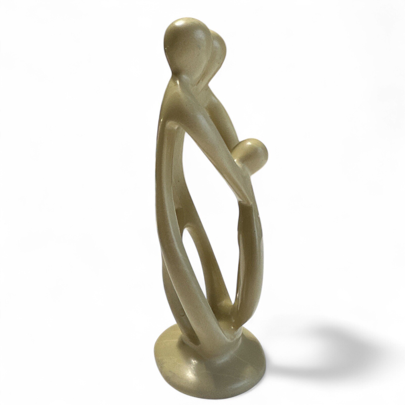 Handcrafted Soapstone Signed Figurine – Man, Woman, and Child Embracing 7.5″