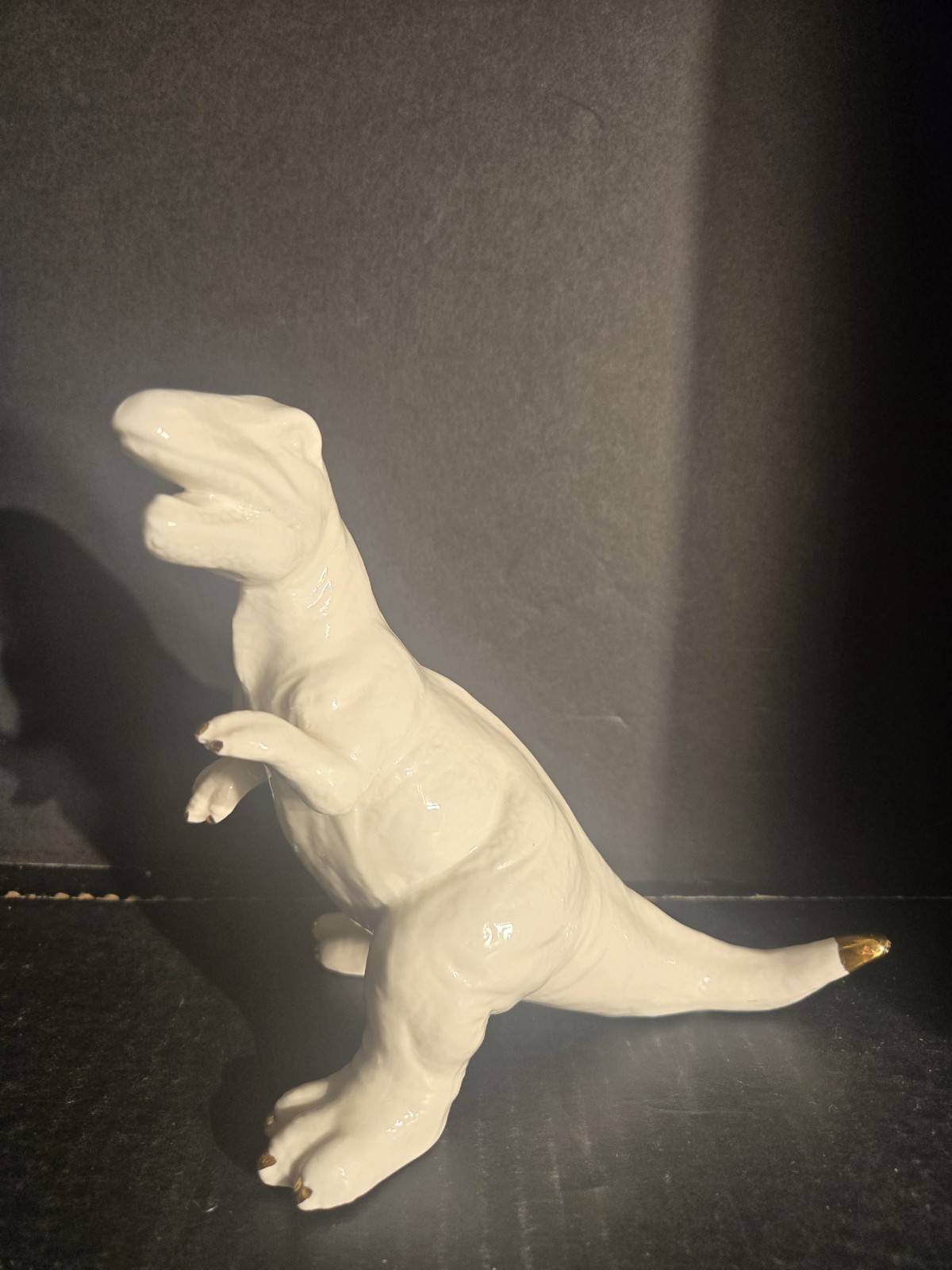 White Porcelain T. Rex with Gold Tipped Tail. 7 Inches