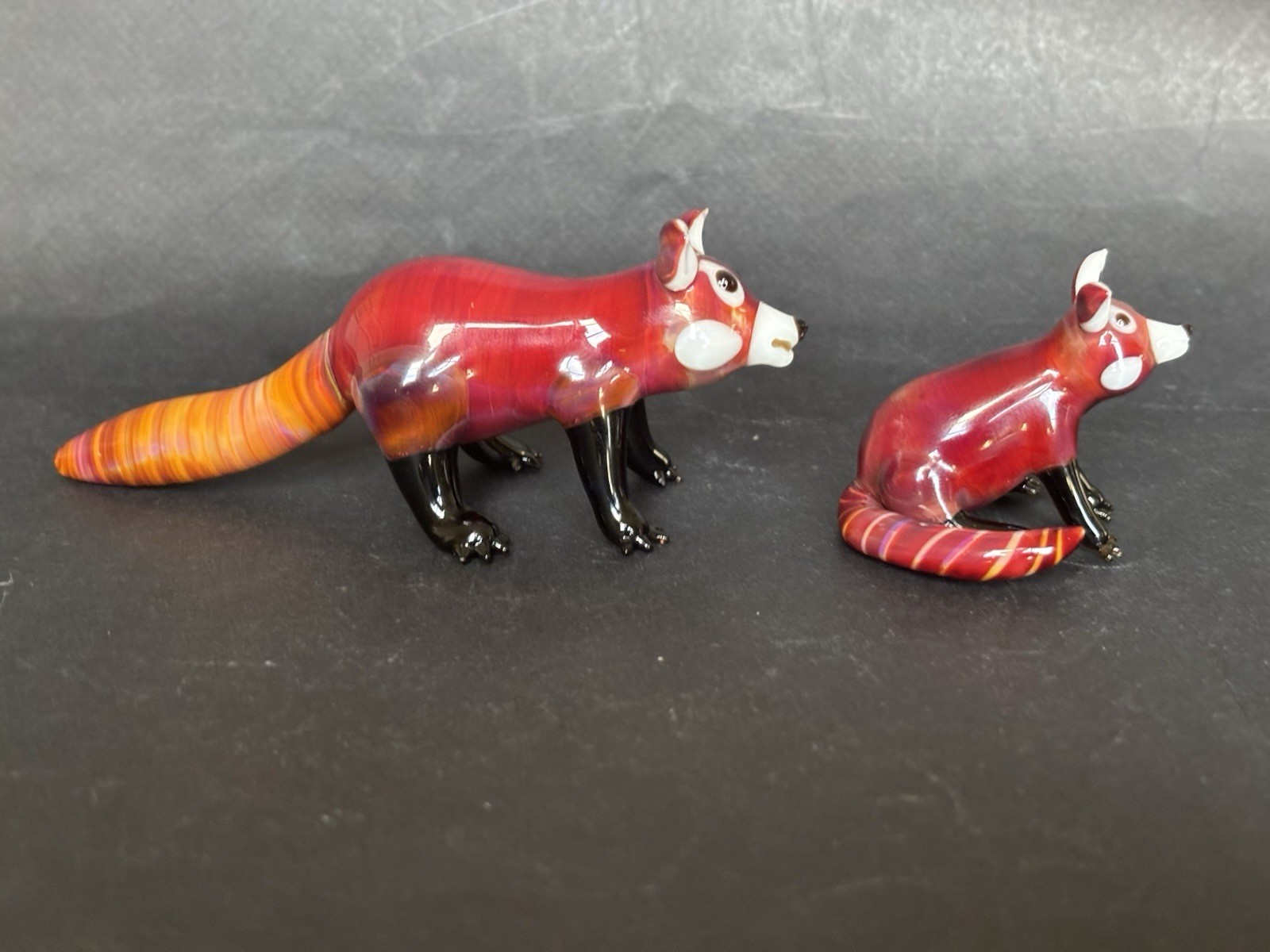 Suellen Fowler Two Glass Red Panda Figurines