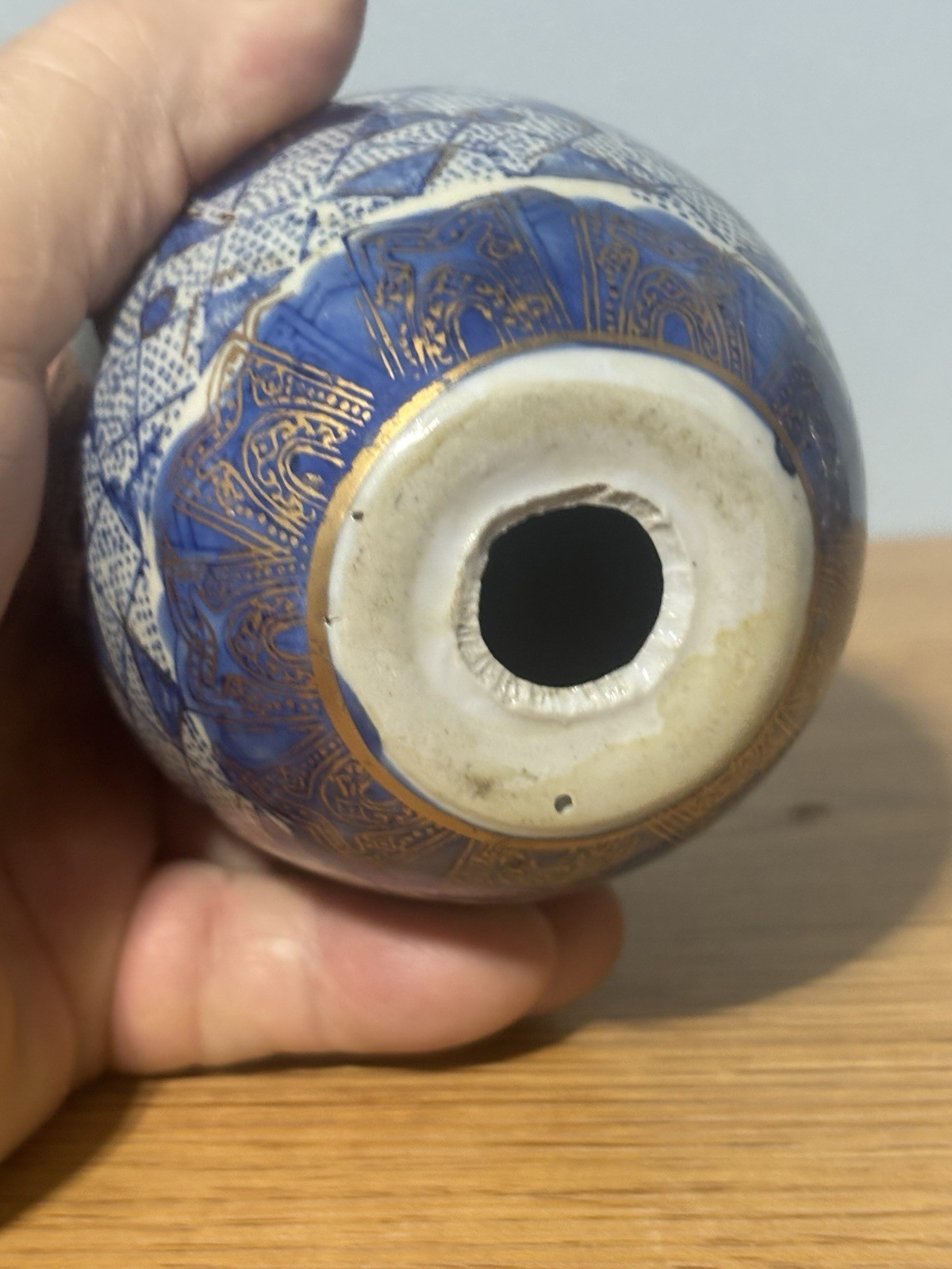 Decorative Porcelain Or Ceramic Egg with Geometric Shapes And Gold Accents