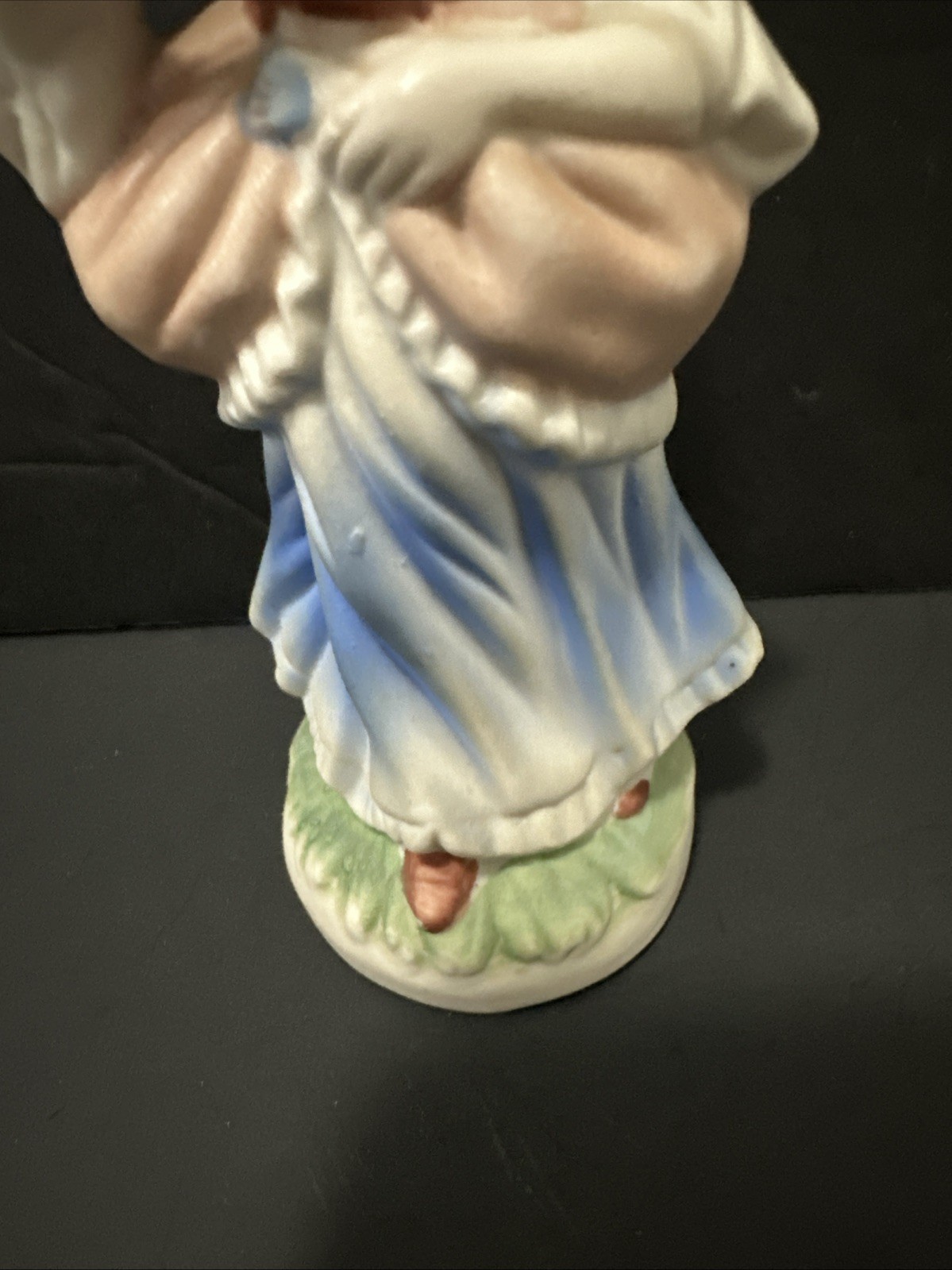 1980s Elegance – Bisque Porcelain Colonial Woman Holding A Flower Figurine. 6”