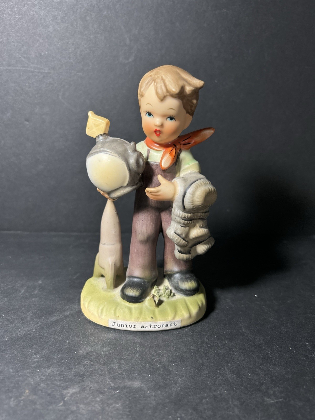 Erich Stauffer Boy Astronaut Figurine U8588 Rare Holding Helmet Next to Rocket