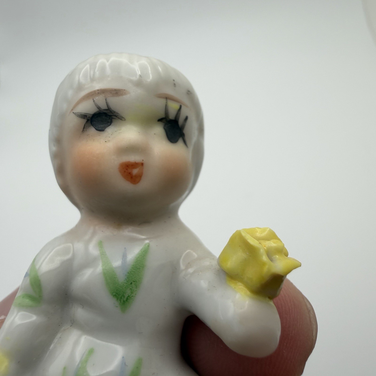 Vintage Napco Style Baby of the Month 2″ Figurine Yellow Flower Taiwan