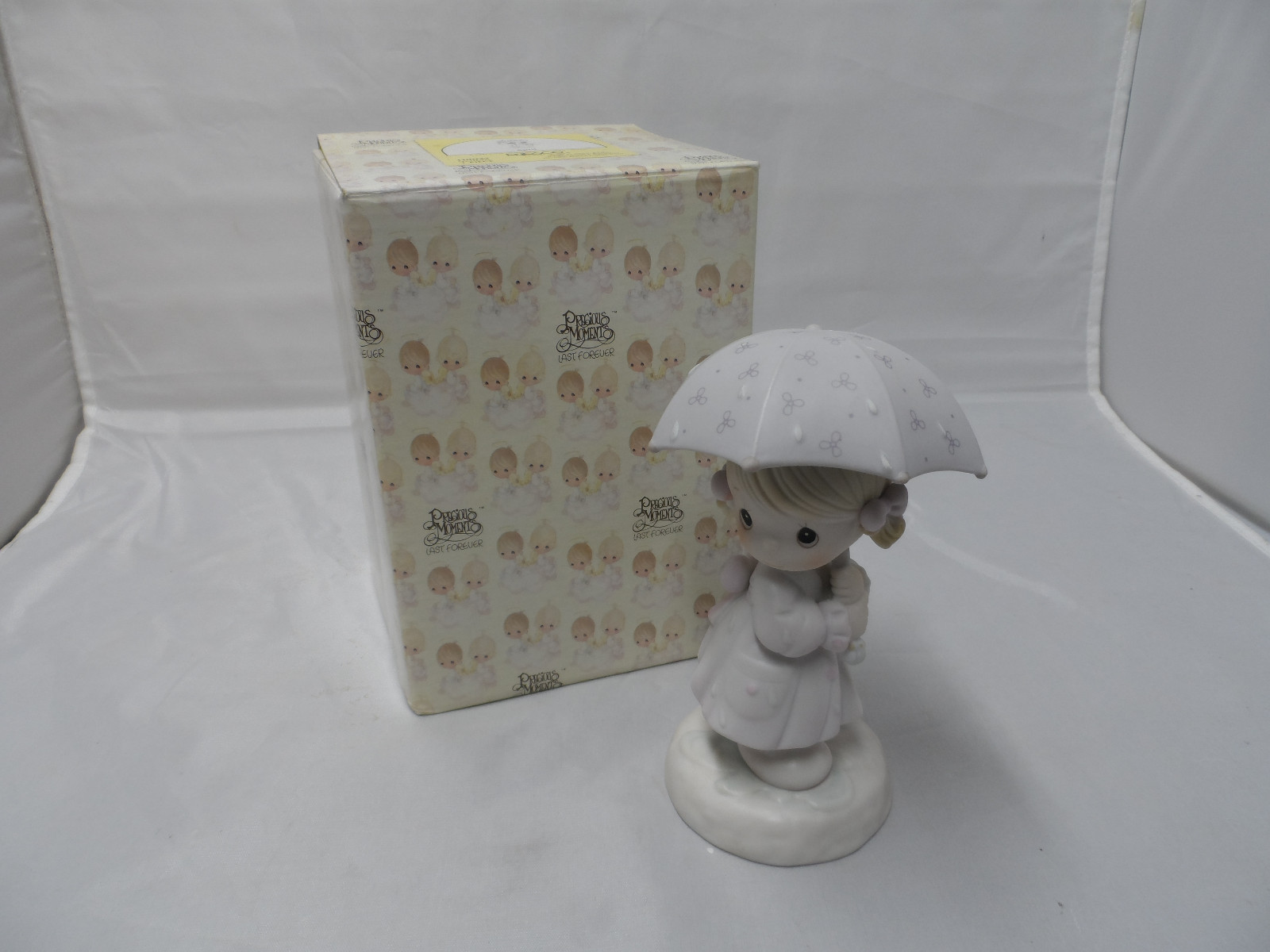 PRECIOUS MOMENTS APRIL 110027 W/BOX AND PAPERWORK G CLEF ON BOTTOM