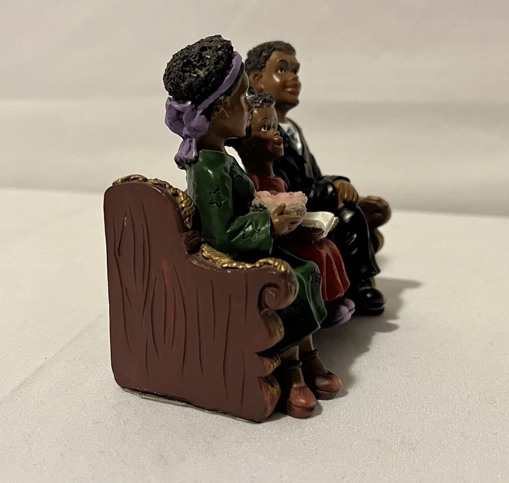 UTI The Church Collection African American Family Of 3 sitting on a Church Pew