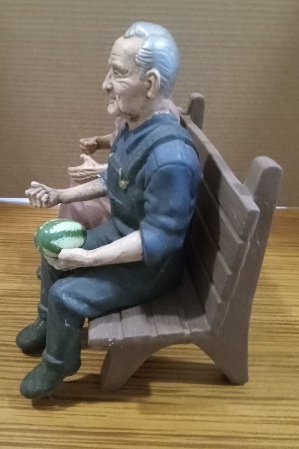 Grandma & Grandpa Sitting On Bench Figurine(thumb On Grandpa Chipped)