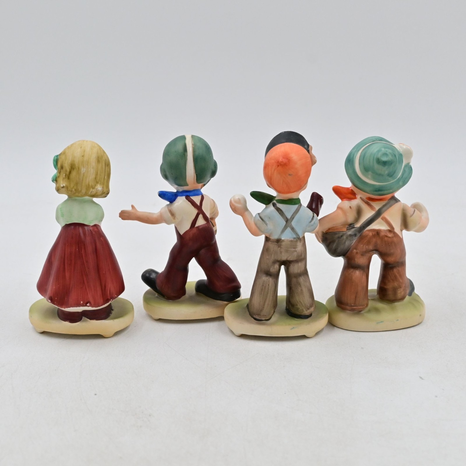 Napcoware Sports Figurines Football, Golf, Baseball Bundle Of 4