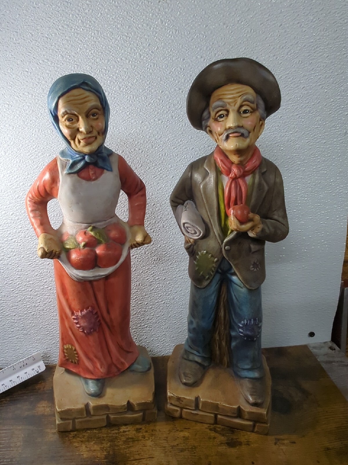 Vintage 13″ Tall Man/Women Figures Decorations Daily News Apples Old Timey