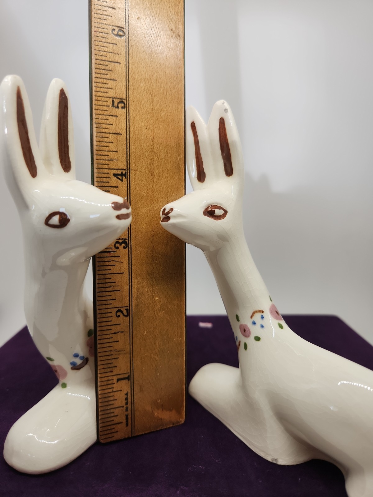 Vintage ceramic deer figurine with painted floral accents. “T” & “W” Marking.