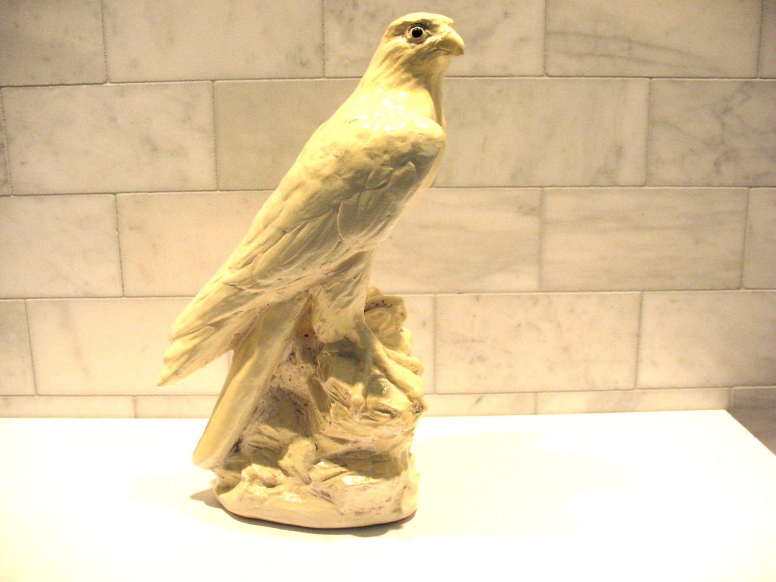 Peregrine Falcon Statue, 1982 by E. Sim, 11 inches tall.