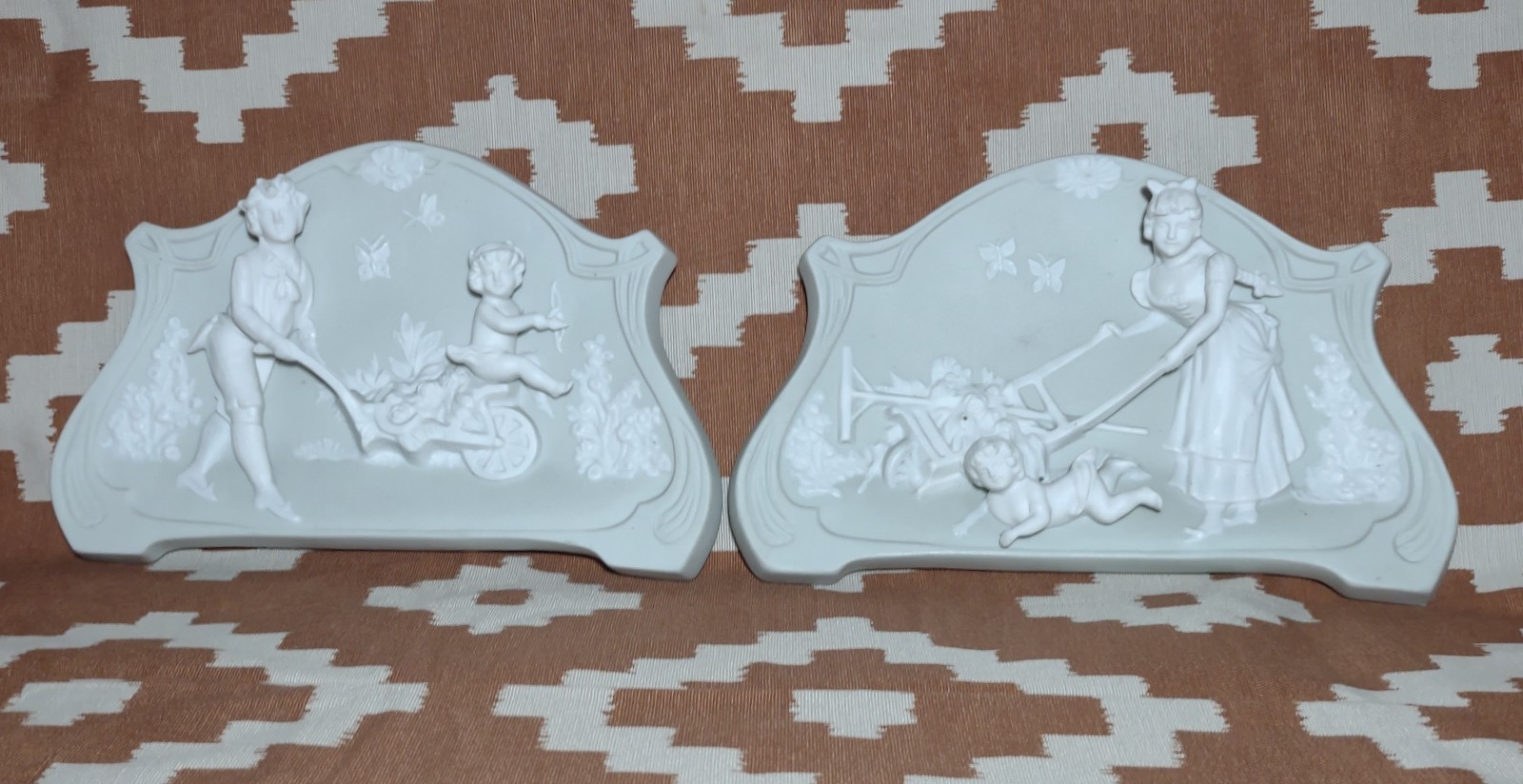 Two Vintage German Kalk Bisque Porcelain Woman & Cherub Wall 3D Relief Plaques