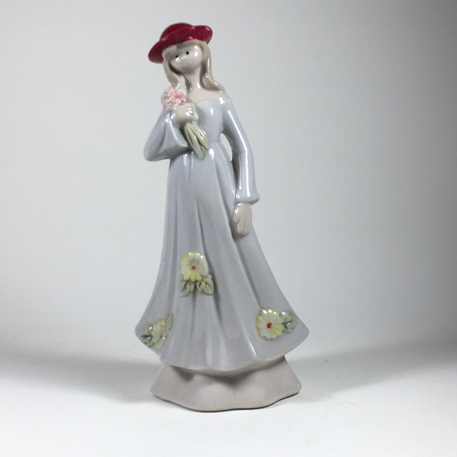 Vintage Ceramic Figurine Woman In Red Hat Holding Flowers 7″ Tall Floral Details