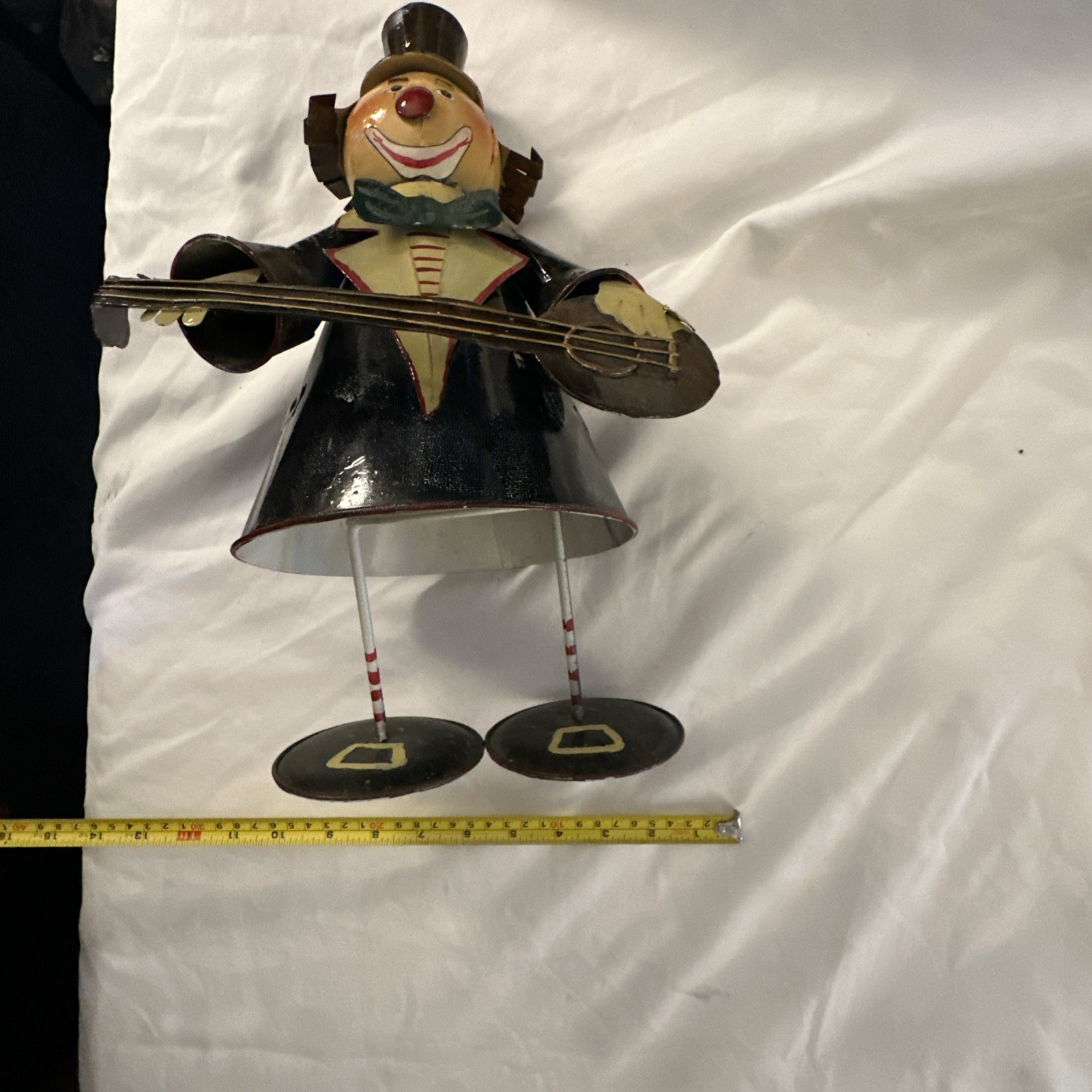 1950’s hand-painted rustic metal clown sculpture. On Vintage Spring So He Moves