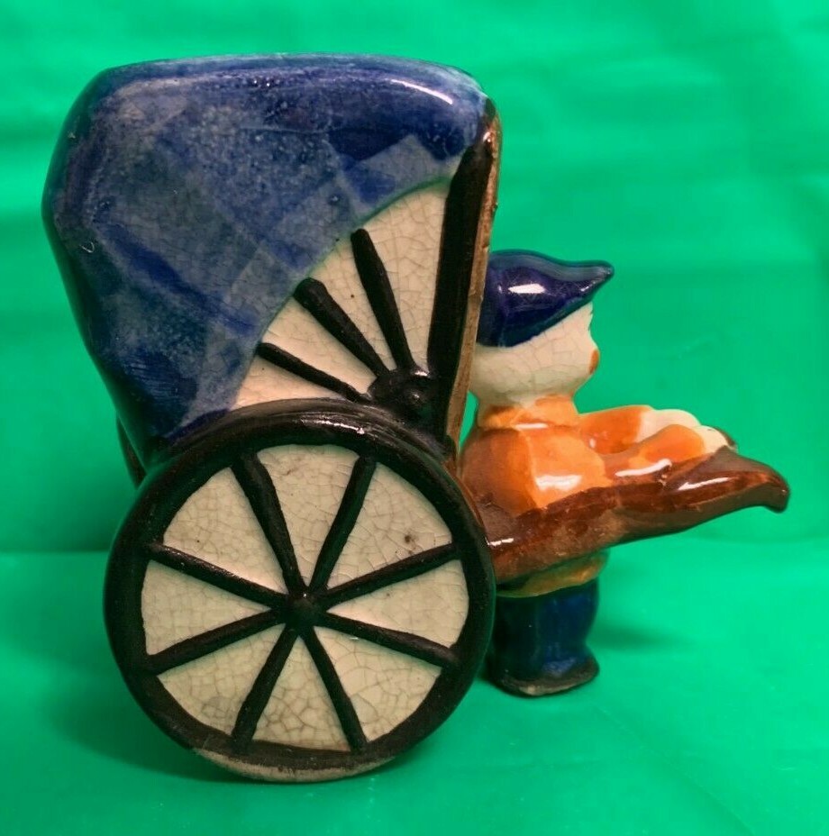 items from Occupied Japan – woman figure, mini tea set and man figure